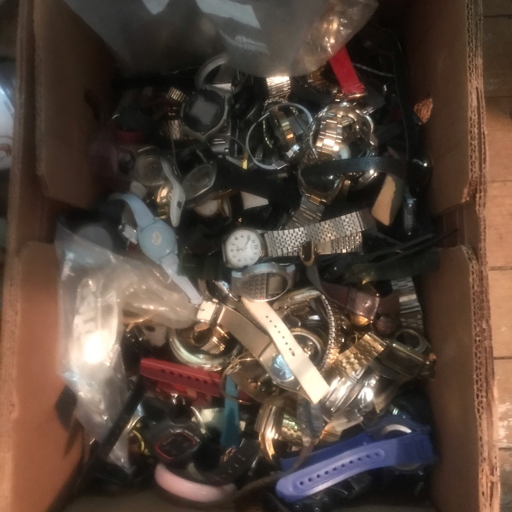 Box of broken watches